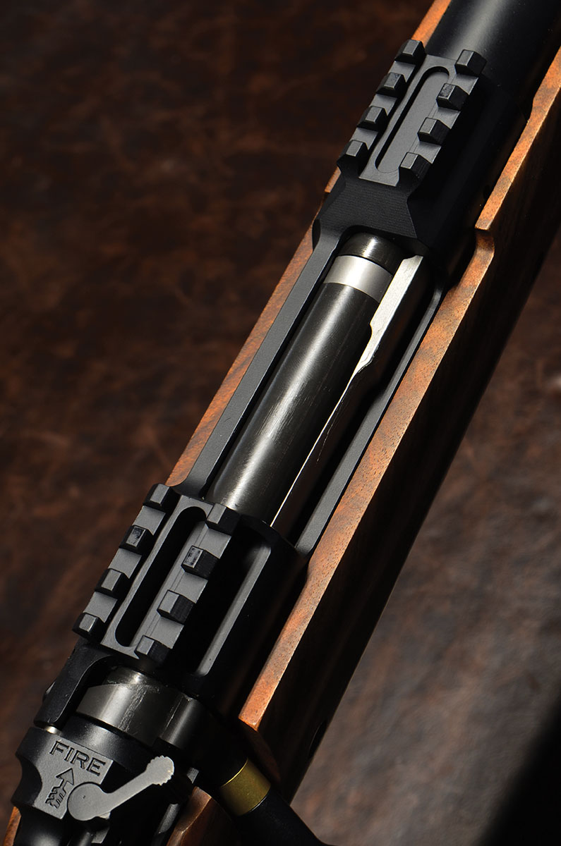 The Model 2022 action has integral  Picatinny bases front and back. The  company is reportedly working on a  variation that will allow the use of  conventional hunting scope mounts.